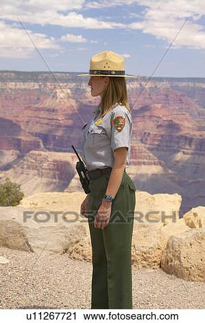 National Park ranger looking at South Rim of Grand Canyon National Park View Large Photo Image Stock Image - National Park ranger looking at South Rim of Grand Canyon National Park. Fotosearch