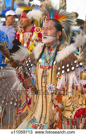 Native Americans in full regalia dancing at Pow wow View Large Photo Image Stock Image - Native Americans in full regalia dancing at Pow wow. Fotosearch