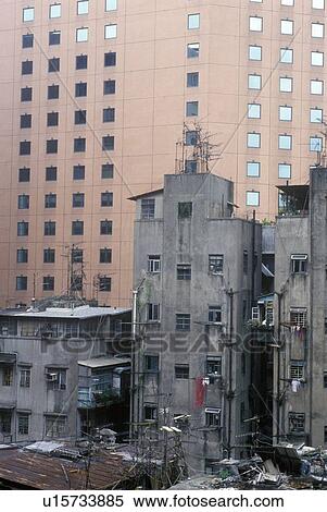Stock Photography - Old buildings and new skyscrapers in Hong Kong. Fotosearch