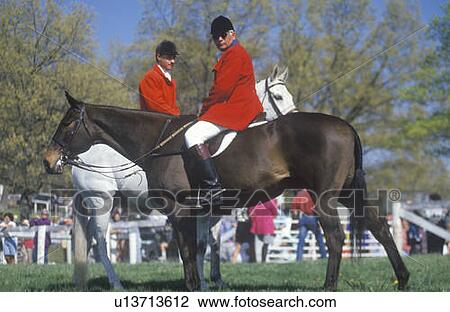 Pair of riders on horseback during Spring Steeplechase race View Large Photo Image Stock Image - Pair of riders on horseback during Spring Steeplechase race. Fotosearch