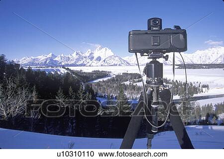 Stock Image - Panoramic camera waiting to take picture in Jackson Hole, Wyoming in the Grand Tetons National Park in the winter. Fotosearch