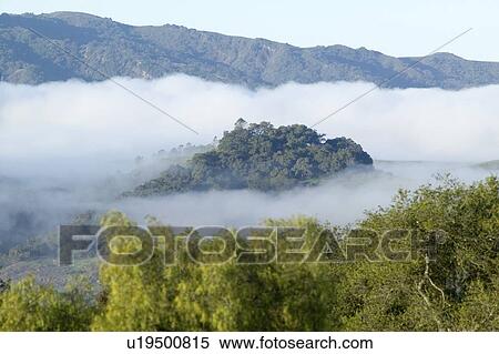 Panoramic landscape with clouds over green spring hills View Large Photo Image Stock Photography - Panoramic landscape with clouds over green spring hills. Fotosearch