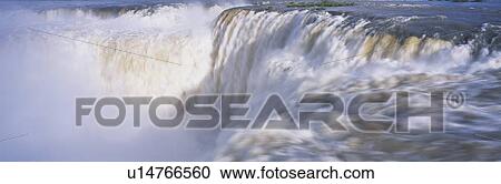 Stock Image - Panoramic view of Iguazu Waterfalls. Fotosearch