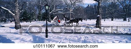 Panoramic view of snowy city street View Large Photo Image Stock Photo - Panoramic view of snowy city street. Fotosearch
