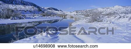 Stock Photo - Panoramic view of winter snow. Fotosearch