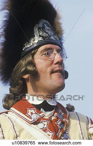 Stock Photography - Participant posing as a British Army Officer during American Revolution reenactment. Fotosearch