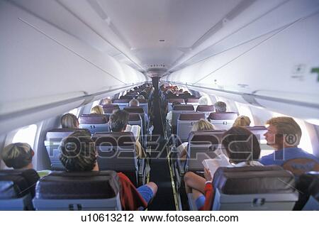 Passengers from the rear of the airplane View Large Photo Image Stock Image - Passengers from the rear of the airplane. Fotosearch