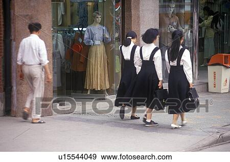 Pedestrians in Shanghai, People's Republic of China View Large Photo Image Stock Photo - Pedestrians in Shanghai, People's Republic of China. Fotosearch