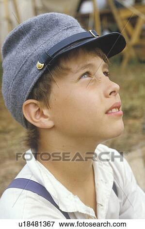 Portrait of young Civil War participant in camp scene during recreation of Battle of Manassas, Virginia View Large Photo Image Stock Photo - Portrait of young Civil War participant in camp scene during recreation of Battle of Manassas, Virginia. Fotosearch