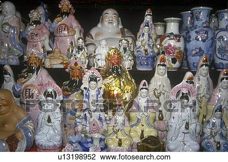 Pottery, statuary and Buddha's for sale View Large Photo Image Stock Image - Pottery, statuary and Buddha's for sale. Fotosearch