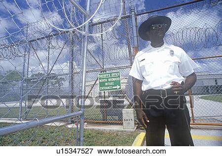 Stock Photo - Prison Guard at Dade County Correctional Facility. Fotosearch