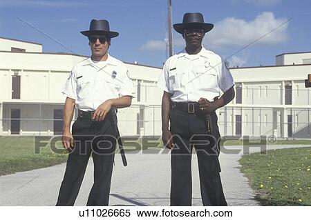 Stock Photography - Prison guards at Dade County Men's Correctional Facility. Fotosearch