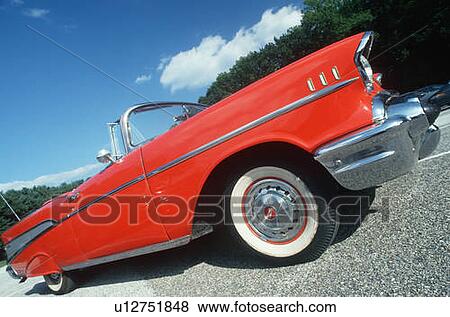 Profile of a red 1957 Chevy convertible View Large Photo Image Stock Photo - Profile of a red 1957 Chevy convertible. Fotosearch