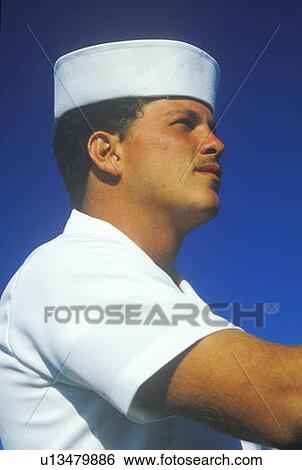 Stock Photograph - Profile of a US Sailor aboard the USS Kennedy. Fotosearch