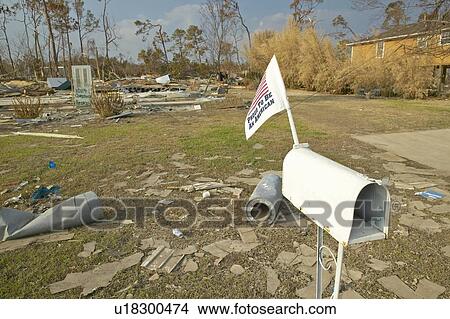 Picture - Proud to be an American mailbox and doorway to house totally destroyed by Hurricane Ivan in Pensacola Florida. Fotosearch