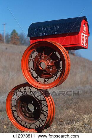 Red barn mailbox on tire rims View Large Photo Image Stock Image - Red barn mailbox on tire rims. Fotosearch