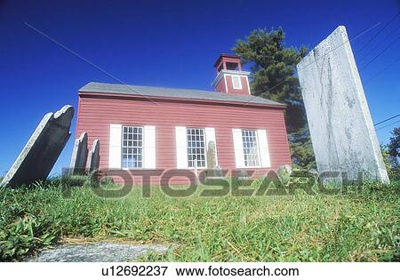 Stock Photo - Red church and cemetery. Fotosearch