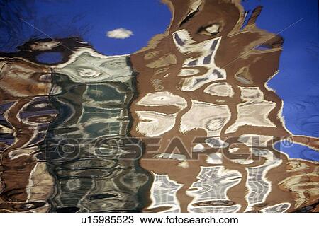 Stock Image - Reflections of Buildings. Fotosearch
