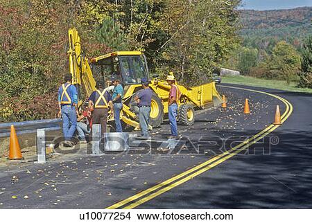 Road Repair workmen with Caterpillar tractor and cones View Large Photo Image Picture - Road Repair workmen with Caterpillar tractor and cones. Fotosearch