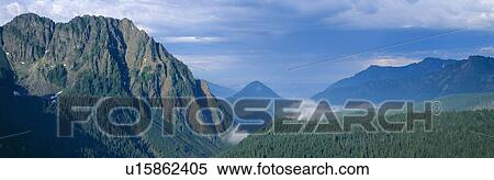 Rugged mountains in Glacier National Park, Montana View Large Photo Image Stock Photography - Rugged mountains in Glacier National Park, Montana. Fotosearch