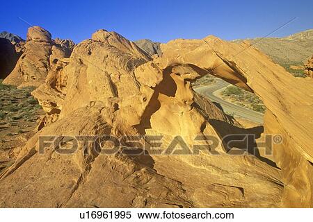 Stock Photography - Sandstone Arch and Window on Figure 8 Road in Valley of Fire State Park, NV. Fotosearch