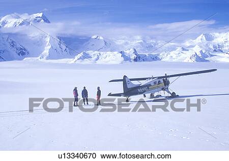 Stock Image - Scout bush airplane on glacier in St. Elias National Park and Preserve, Wrangell Mountains, Wrangell, Alaska. Fotosearch