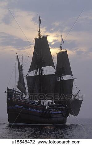 Stock Image - Silhouette of a replica of Mayflower II, Plymouth, Massachusetts. Fotosearch
