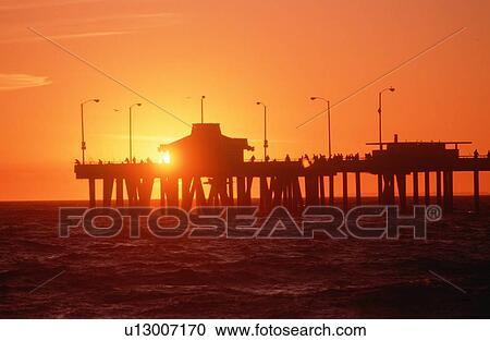 Silhouetted fishermen on Venice Pier at sunset, California View Large Photo Image Stock Image - Silhouetted fishermen on Venice Pier at sunset, California. Fotosearch