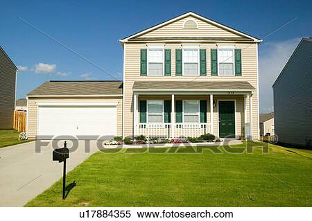 Stock Photography - Single house in new housing development. Fotosearch