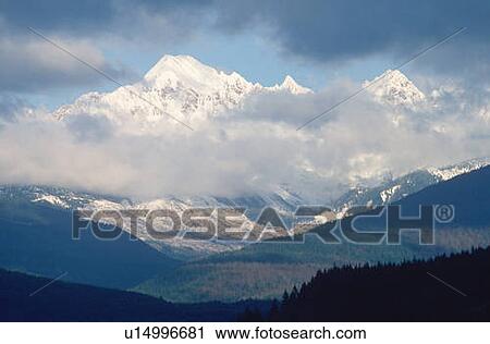 Stock Image - Snowy mountain peaks of Mt. Baker, Washington . Fotosearch