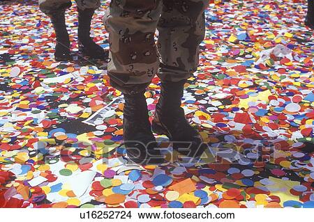 Soldiers' Boots Standing in Confetti View Large Photo Image Picture - Soldiers' Boots Standing in Confetti. Fotosearch