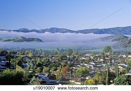 Spring field and cloud layers in Ojai, California View Large Photo Image Stock Photo - Spring field and cloud layers in Ojai, California. Fotosearch