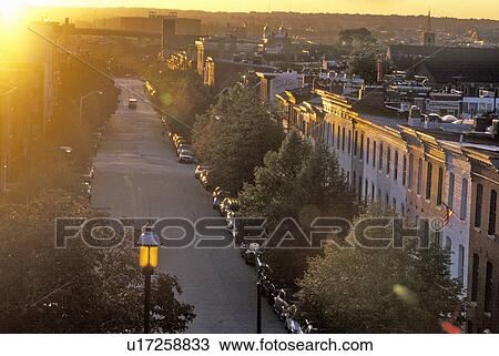 Stock Image - Street at Sunset, Baltimore, Maryland. Fotosearch