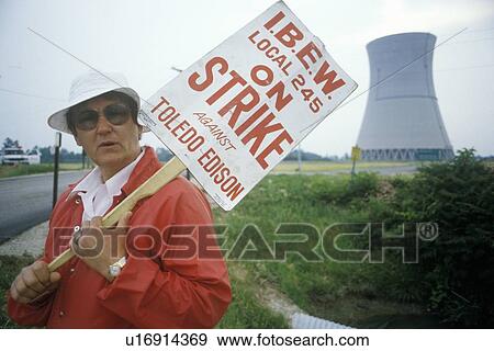 Striker with placard at Davis-Besse Nuclear Power Station View Large Photo Image Stock Photo - Striker with placard at Davis-Besse Nuclear Power Station. Fotosearch