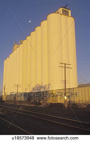 Sunrise on a grain silo View Large Photo Image Stock Photo - Sunrise on a grain silo. Fotosearch