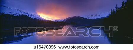 Stock Photograph - Sunset over Resurrection River and Exit Glacier at Harding ice field, Seward, Alaska. Fotosearch