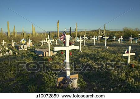 Sunset view of a Catholic cemetery View Large Photo Image Stock Photo - Sunset view of a Catholic cemetery. Fotosearch