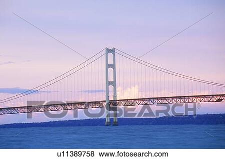 Stock Photo - The Mackinac Bridge at dusk in upper peninsula Michigan. Fotosearch