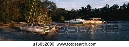 These are small sailboats moored in Basin Harbor at sunset View Large Photo Image Stock Image - These are small sailboats moored in Basin Harbor at sunset. Fotosearch