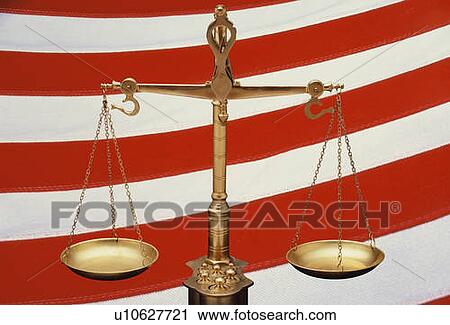 Stock Image - These are the golden Scales of Justice. Fotosearch
