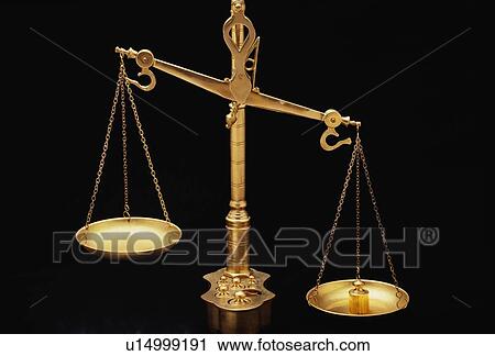 Stock Image - These are the golden Scales of Justice. Fotosearch