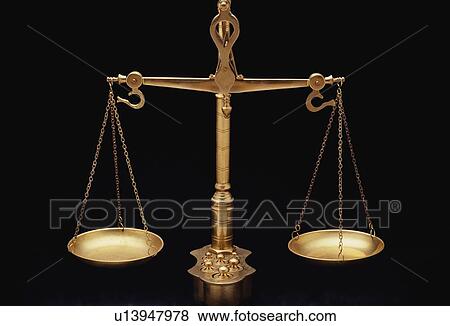 Stock Photo - These are the golden scales of justice. Fotosearch