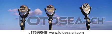 Stock Photo - These are the old-fashioned twenty-five cent view binoculars for tourists. Fotosearch