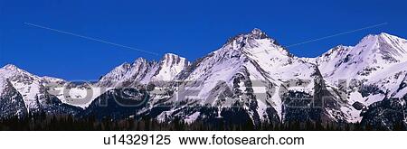 These are the rugged snow covered San Juan Mountains View Large Photo Image Stock Photography - These are the rugged snow covered San Juan Mountains. Fotosearch