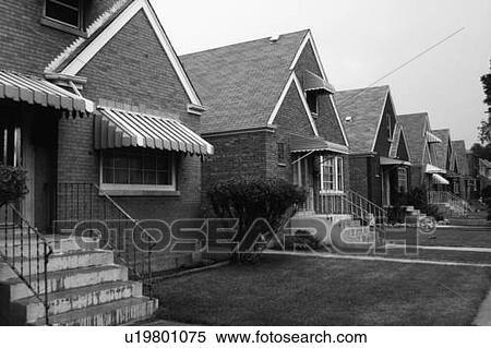 This is a black and white image of a row of single family houses View Large Photo Image Stock Photography - This is a black and white image of a row of single family houses. Fotosearch