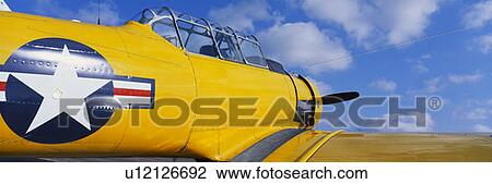 This is a bright yellow Model G 1942 Flight Trainer View Large Photo Image Stock Image - This is a bright yellow Model G 1942 Flight Trainer. Fotosearch