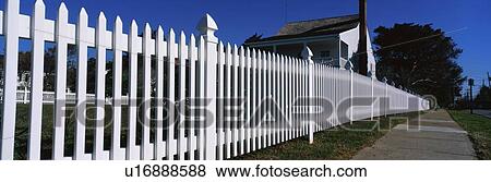 This is a close up of a white picket fence View Large Photo Image Stock Photo - This is a close up of a white picket fence. Fotosearch