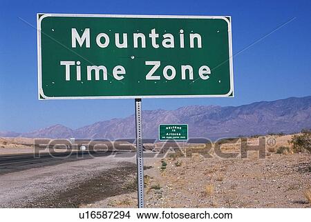 This is a road sign indicating a change to the Mountain Time Zone View Large Photo Image Picture - This is a road sign indicating a change to the Mountain Time Zone. Fotosearch