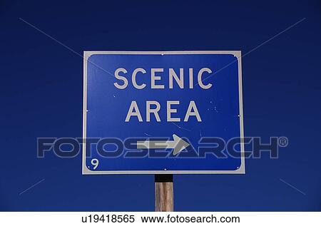 Stock Photography - This is a road sign that says, Scenic Area. Fotosearch