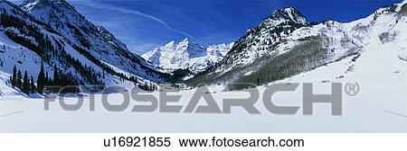 This is Pyramid Peak in the Maroon Bells after a winter snow storm. The altitude is 14, 010 feet. View Large Photo Image Stock Photography - This is Pyramid Peak in the Maroon Bells after a winter snow storm. The altitude is 14, 010 feet.. Fotosearch
